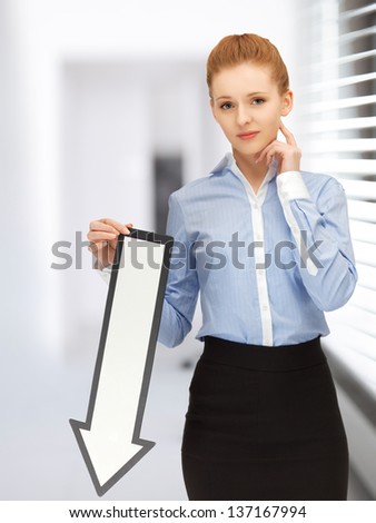 picture of unhappy woman with direction arrow sign