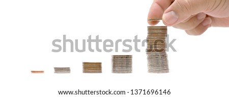 Hand put money coins to stack of coins isolated on white background, Money, Financial, Business Growth and saving money concept