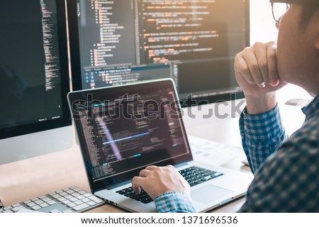 Stress developing programming looking coding technology working on computer. Royalty-Free Stock Photo #1371696536