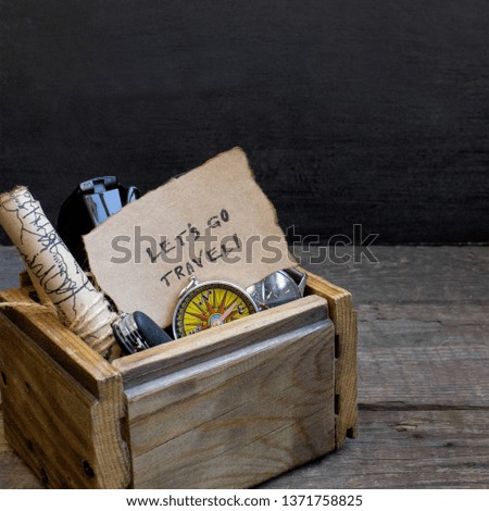 Travel, wooden box background, compass, map