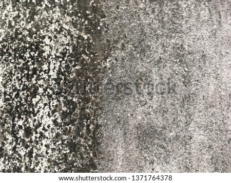 Dirty white dark cement wall background 