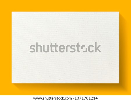 White canvas frame on a yellow background with soft shadow.