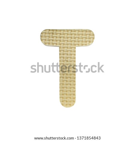 one letter in the set of colorful letters with foam, letter T isolated on white background