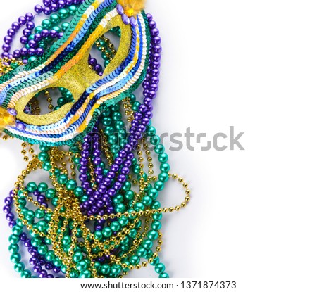 Festive mask with beads on white background