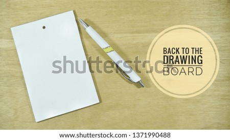 Image with idiom - Back to the drawing board