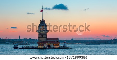 Istanbul Maiden Tower (kiz kulesi) with full moon - Istanbul, Turkey 