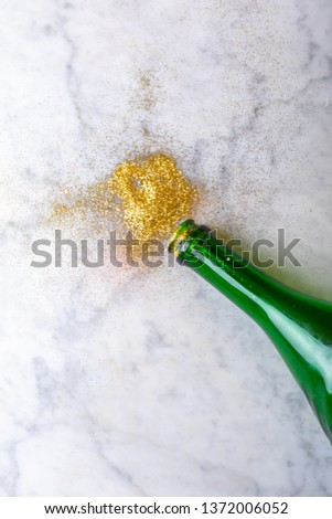 glass bottle with  Glitter