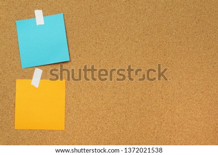 blank paper notes stick on cork board. cork board with blank post it. sticker empty note.
