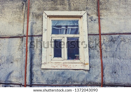 old village house window, ruined house with preserved window