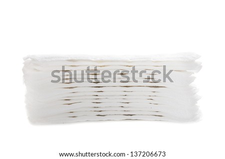 Woman hygienic every day panty liners in a pile isolated on white