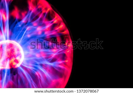 electric plasma in a glass ball, with lightnings