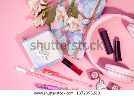 Pink set with earphones, notebook, lipstick and purse