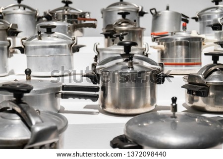 Antique pressure cookers built up in the kitchen