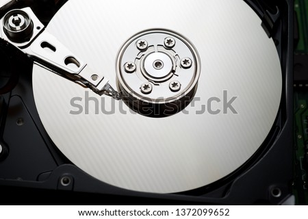 Closeup of an open computer hard drive.