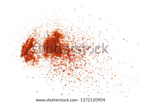 Ground red paprika powder pile isolated on white background, top view Royalty-Free Stock Photo #1372120904