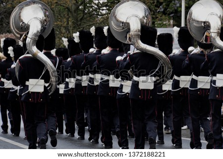 Adult Group Of Musicians With Musical Brass Instruments On The City Street. Dark Blue And Grey Festive Background.