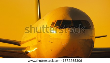 Detail view of airliner in warm sunlight.