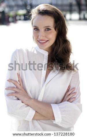 Happy young woman. Outdoor portrait