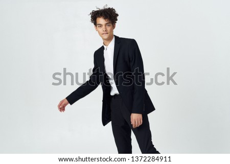 nice guy in a black suit office professional