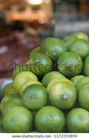 Organic food display: green lemon