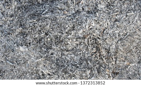 Background with ash of burned wood and grass