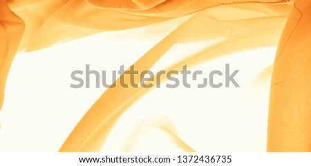 texture background pattern. Yellow silk fabric with a subtle matte sheen. It is perfect for your design, accents, wallpapers, posters and postcards.