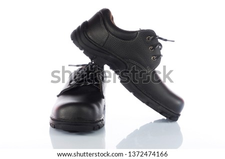 Modern working boots isolated on white background. 