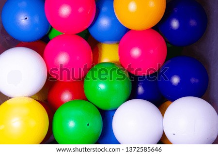 Plastic colored children's balls. Bright round balls for children's pools and games
