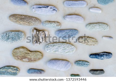 group of sea pebble background top view
