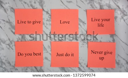 Motivational words on colored sheets of paper. Creativity and art. Study, education, work. Office, school, University. Stationery. Rainbow