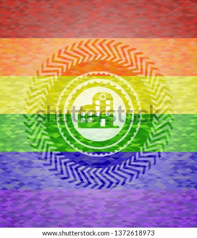 hospital icon inside emblem on mosaic background with the colors of the LGBT flag