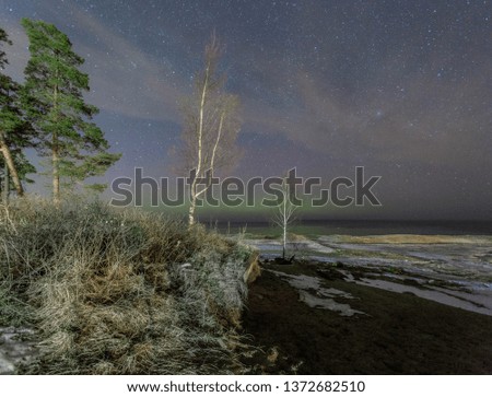 Northern lights on lake Ladoga. Leningrad region. Russia