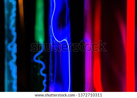 Abstract fluorescent background - multicolored glow of various inert gases in plasma tubes under the action of an electric discharge

 Royalty-Free Stock Photo #1372710311