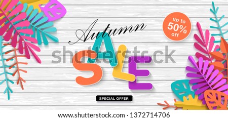 Summer or autumn sale, bright advertising banner with colorful leaves, layered texture in the style of paper cut, volumetric inscription Sale, horizontal background, vector illustration