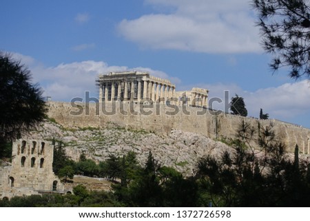 Photo of iconic Parthenon in Acropolis hill as seen from Filopapou hill, Athens historic centre, Attica, Greece