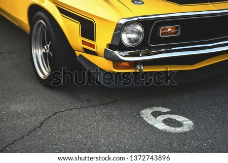 muscle car on parking lot