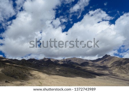 Ladakh is a kingdom of clouds and high hills. it is beautiful to see mystic shaped clouds wandering and roaming over the sky and sitting on Himalayan Mountains. its a Natural phenomenon.