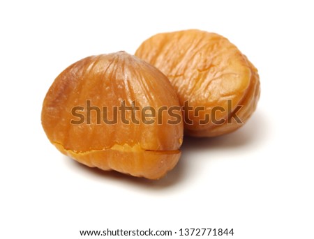 chinese food, peeled roasted chestnut on white background Royalty-Free Stock Photo #1372771844