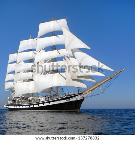 Snow-white sails of the ship Royalty-Free Stock Photo #137278832