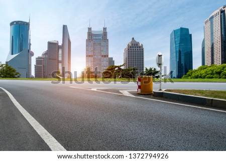 Empty Asphalt Road Through Modern City of Shanghai, China

