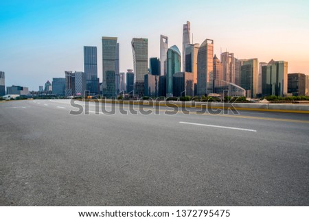 Empty Asphalt Road Through Modern City of Shanghai, China

