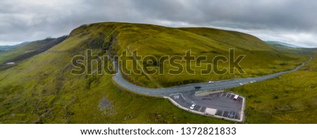 Conor Pass, The 456-metre (1,496 ft) high pass connects Dingle, on the south-western end of the Dingle Peninsula, with Brandon Bay and Castlegregory in the north-east. Royalty-Free Stock Photo #1372821833