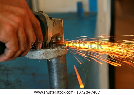 The grinding sparks