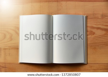 Blank catalog, magazines,book mock up on wood background. Empty Note Paper. Top view