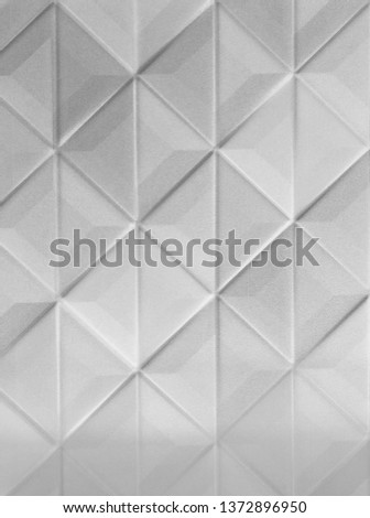Beautiful monochrome color on square pattern. black and white background pattern in geometric shape. emboss of tiles in modern style with noise texture, grains on emboss pattern background