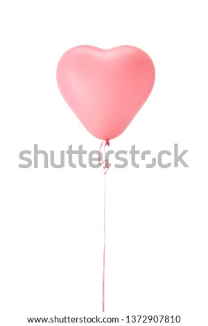 Single heart shaped balloon isolated on white