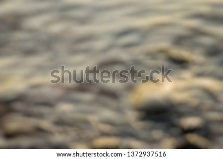 Abstract​ Stone​ rock​ sand​ and​ gravel​ at​ around​ the​ mountain​ in Srinakarin dam in Kanchanaburi, Thailand​ while​ we​ are​ rowing​ a​ craft .Background blur.