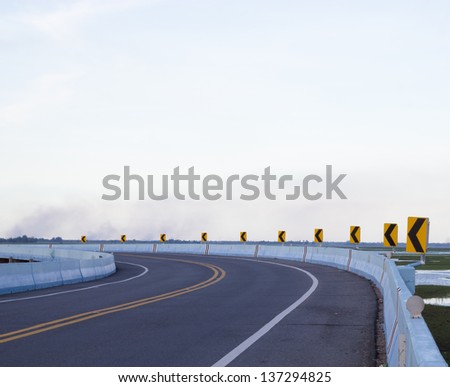 Road bridge across the lake