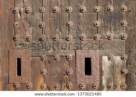 An ancient wooden door at Toledo city gate
