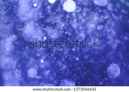 nice blue many falling light one color bokeh texture - abstract photo background